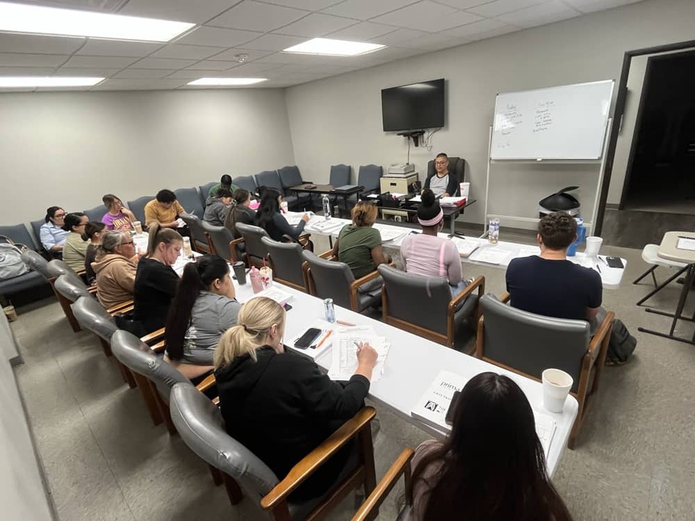 Learners collaborating around radiographic images in the classroom