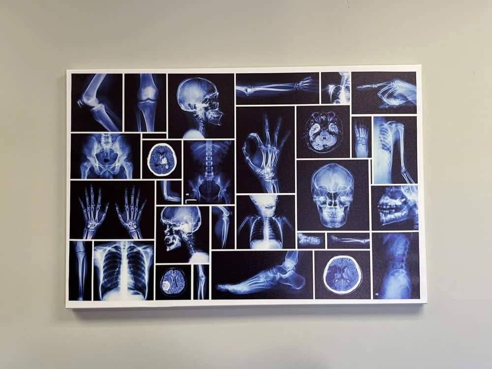 Admissions specialist greeting a prospective student at the front desk