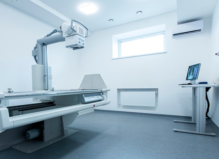 primaMED student setting up an X-ray machine during clinical rotations
